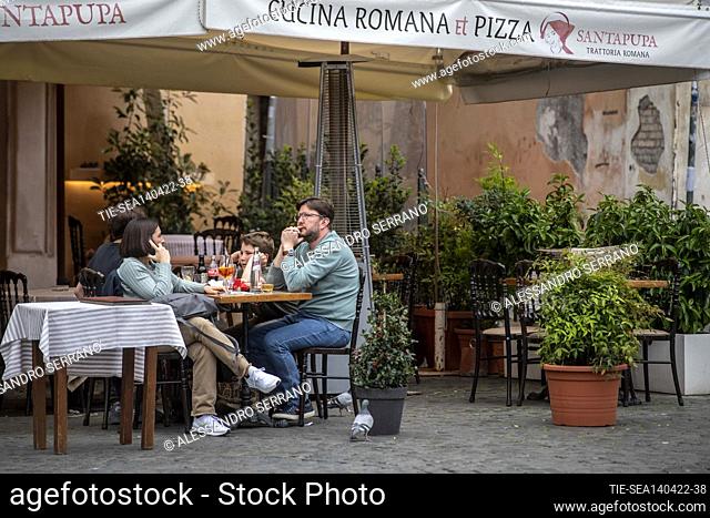 Historic center of Rome. Tourists flock to bars and restaurants during happy hour. Tourism activity is recovering after the loosening of prevention regulations...