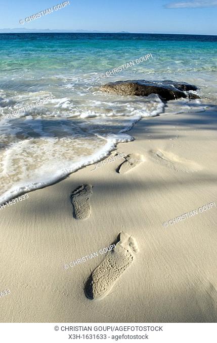 footprints on the beach, Tsarabanjina island, Mitsio archipelago, Republic of Madagascar, Indian Ocean