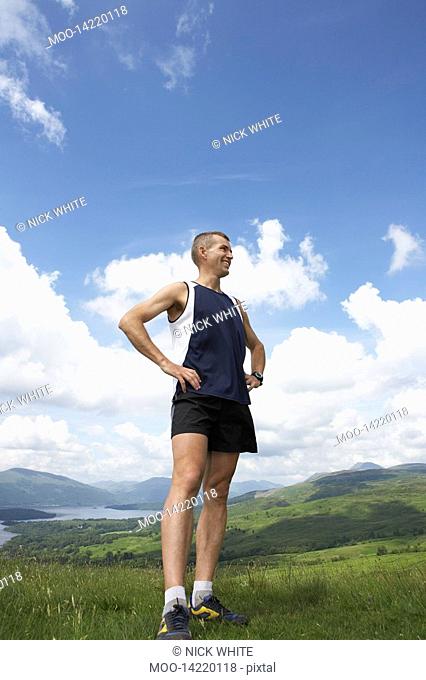Man standing on hillside