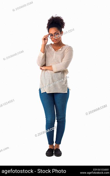 Full length portrait of african american mixed race woman touching glasses isolated on white background, casual people