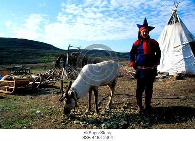Norway, Near Honningsvag, Sami Man Laplander With Reindeer