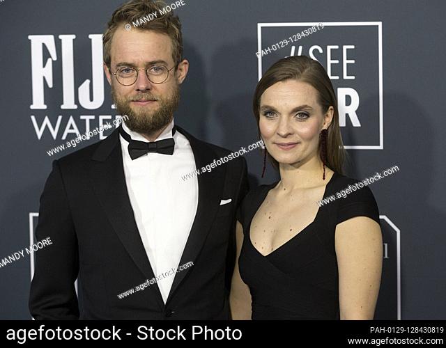 Sam Slater and Hildur Gudnadottir attend the 25th Annual Critics' Choice Awards at Barker Hangar in Santa Monica, Los Angeles, California, USA