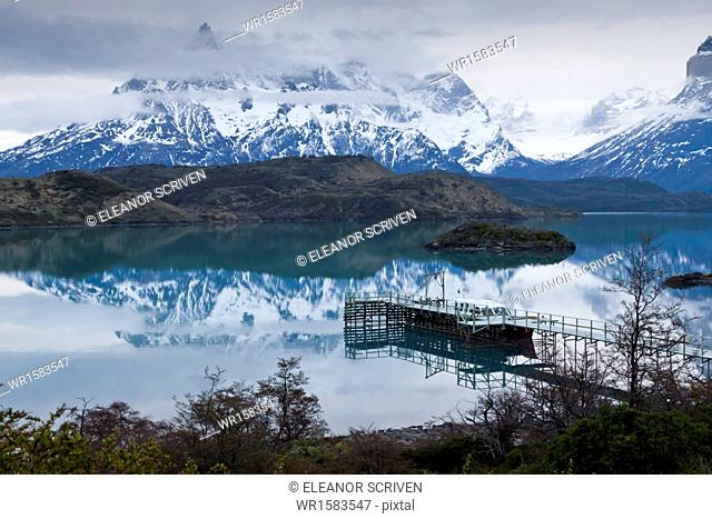 Boatdock and late evenng reflections in Lago Pehoe, Torres del Paine National Park, Patagonia, Chile, South America