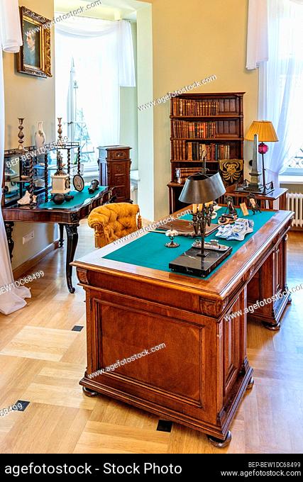 Oblegorek, Swietokrzyskie / Poland - 2020/08/16: Historic study desk inside manor house and museum of Henryk Sienkiewicz, polish novelist and journalist