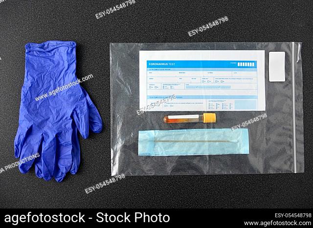 test tube, cotton swab, medical report and gloves