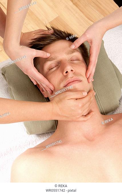 Young man relaxing during massage
