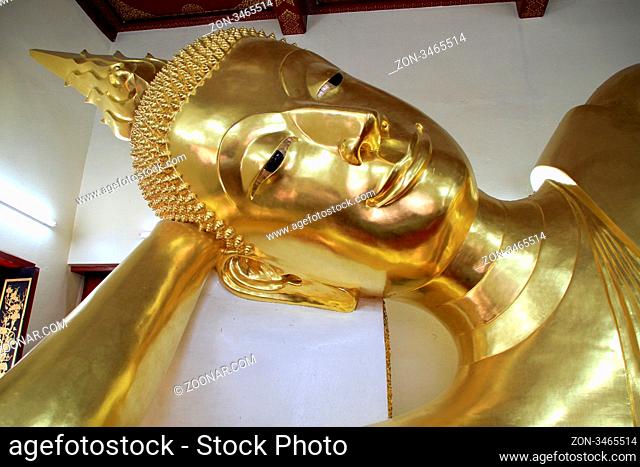 Head of golden sleeping Buddha in Chedi Phra Pathom, Thailand