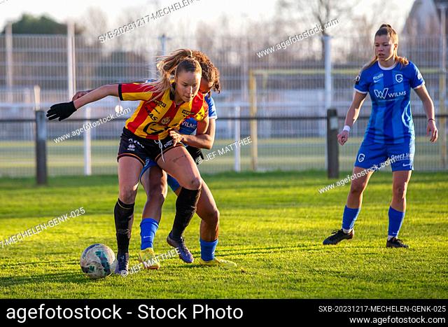 Daisy Baudewijns (7) of KV Mechelen and Thirsa De Meester (7) of Genk battle for the ball pictured during a female soccer game between KV Mechelen and KRC Genk...