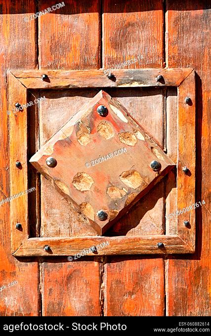 door  in italy old ancian wood and traditional        texture nail