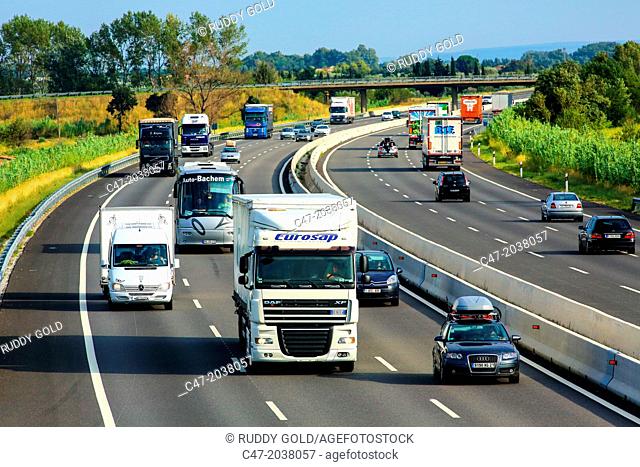 Catalunya, Spain, Girona province, Gironés area, Traffic at the AP-7 Autopista del Mediterráneo near Pont de Molins. The Autopista AP-7 is a Spanish highway and...
