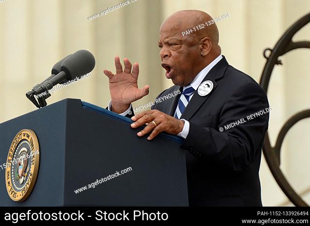 Civil rights leader and Democratic Representative from Georgia John Lewis delivers remarks in front of a freedom bell during the 'Let Freedom Ring'...