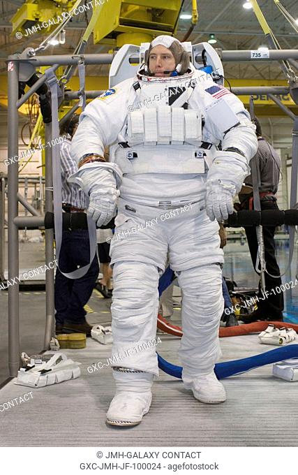 Astronaut Andrew J. Feustel, STS-125 mission specialist, attired in a training version of the Extravehicular Mobility Unit (EMU) spacesuit