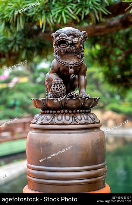Lion statue in the Nan Lian Garden by Chi Lin Nunnery in Hong Kong