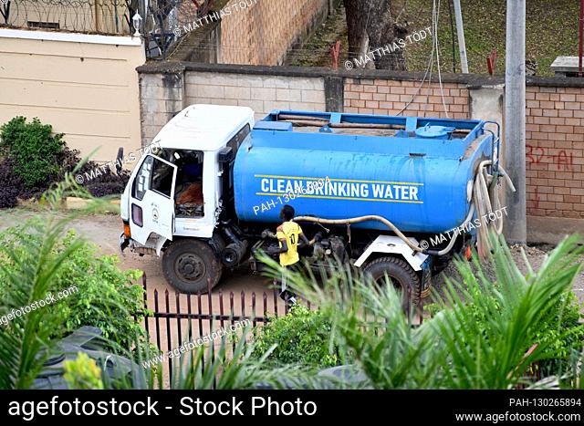 Tank trucks with the appropriate inscription take over the fresh water supply of households in Juba / South Sudan, taken on 07.12.2019