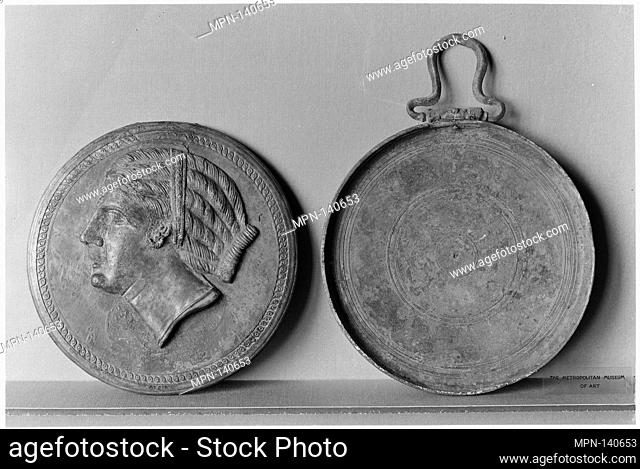 Bronze box mirror. Period: Late Classical; Date: mid-4th century B.C; Culture: Greek; Medium: Bronze; Dimensions: diameter 6 1/4in. (15