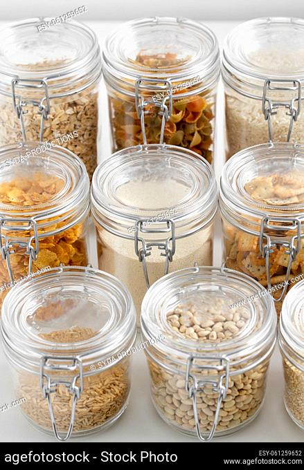 close up of jars with cereals or groceries