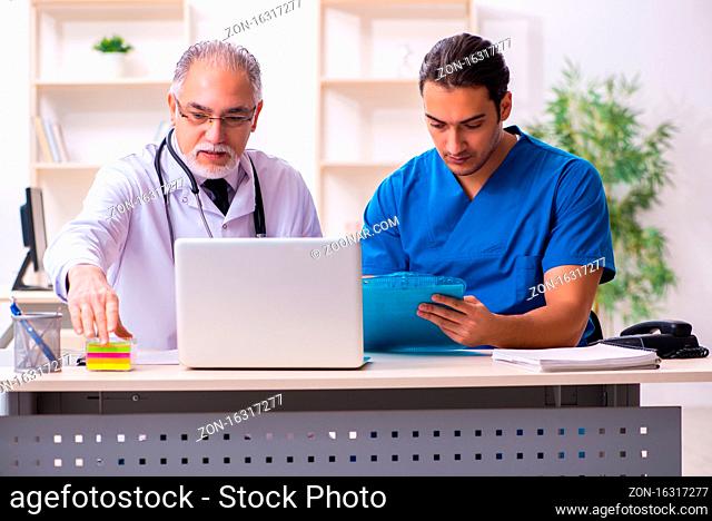 Two male doctors working in the modern clinic