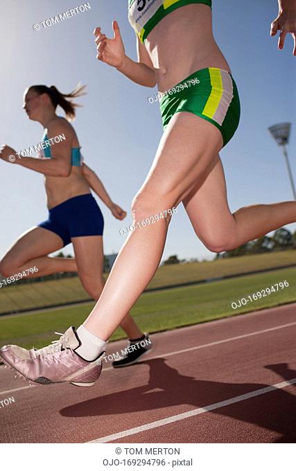Women running on track