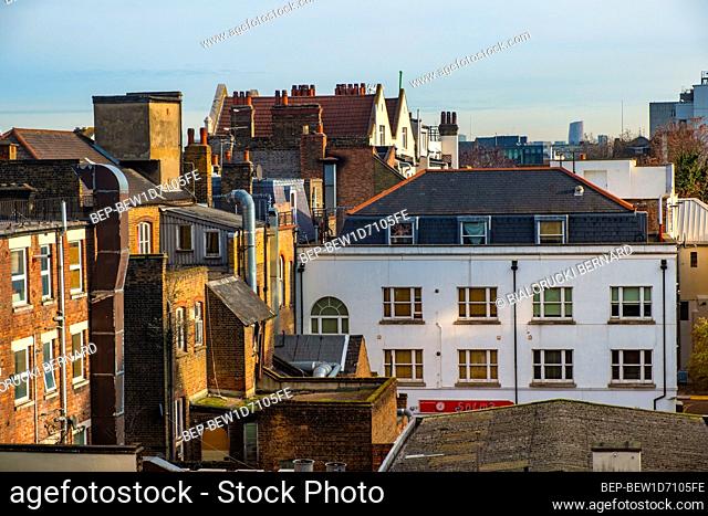 London, England / United Kingdom - 2019/01/29: Panoramic view of the Whitechapel district of East London with fusion of traditional and modernistic architecture...