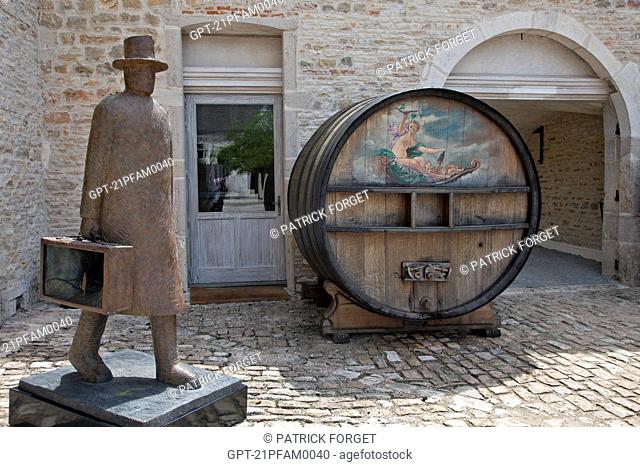 SCULPTURE BY JEAN-MICHEL FOLON ENTITLED 'MY WAY', EXHIBITION IN FRONT OF THE OLD CASKS BIG WINEMAKING VATS AT THE CHATEAU DE POMMARD