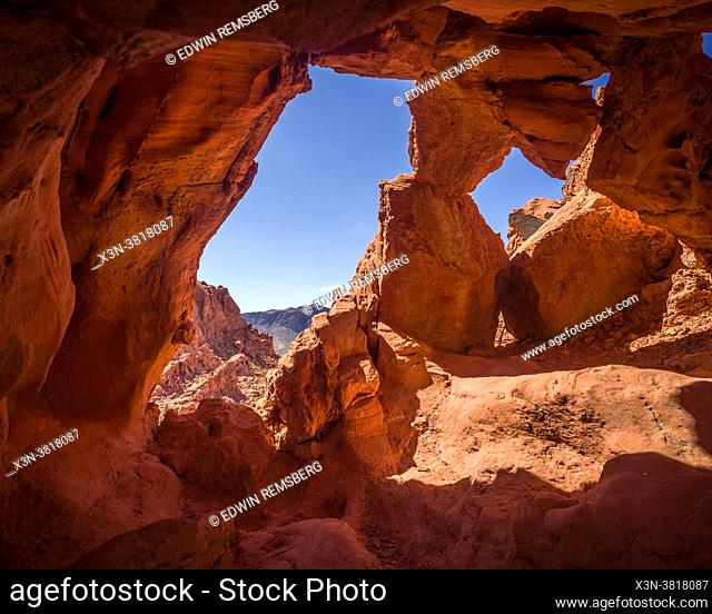 Peaking through rock formation at Red Rock Canyon, Nevada