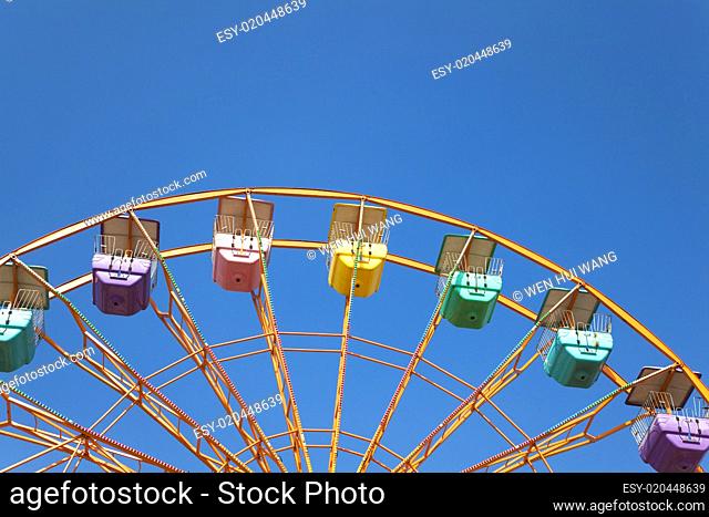 ferris wheel and blue sky background