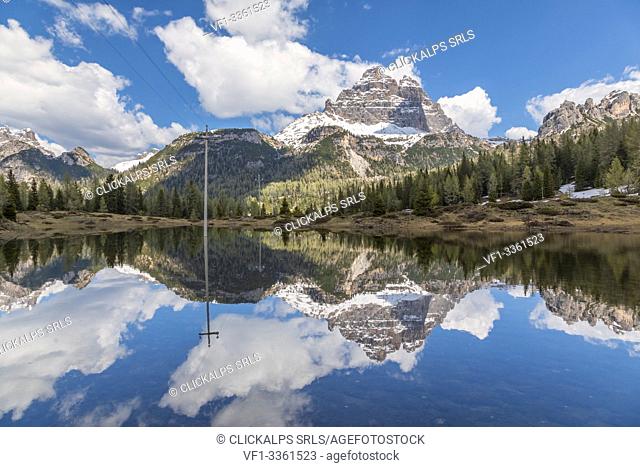 Tre Cime di Lavaredo reflected in an ephemeral lake at the thaw, dolomites, auronzo di cadore, belluno, veneto