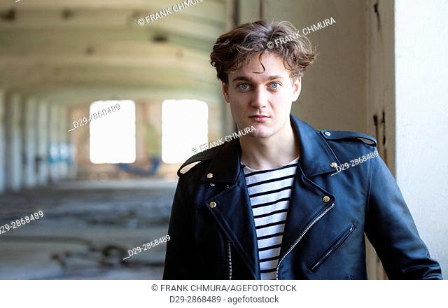Portrait of a Young Man in Abandon Building