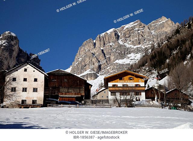 Houses in front of the Sella massif, Kolfuschg, Colfosco, Val Badia, Alta Badia, Dolomites, South Tyrol, Italy, Europe