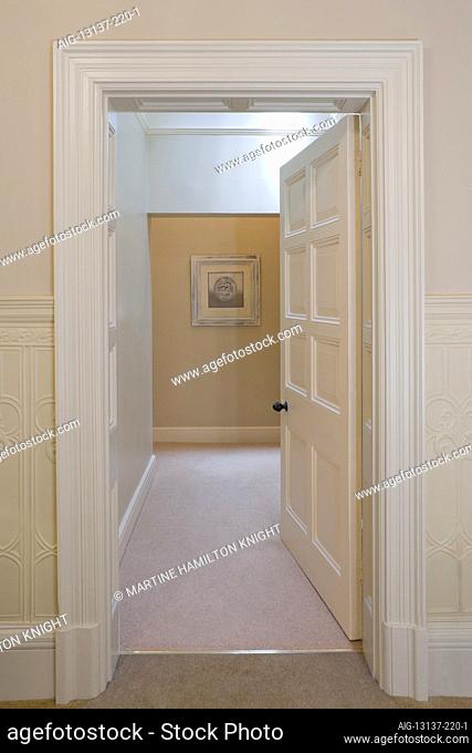 Landing with pannelled doorway and architrave | Architect: Attributed to A.R.Calvert (c 1880) |