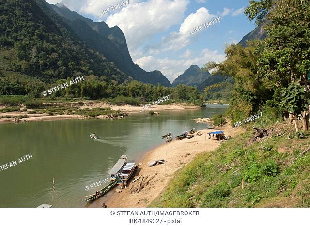 River landscape, boats on the shore, Nam Ou river, Muang Ngoi Kao, Luang Prabang province, Laos, Southeast Asia, Asia