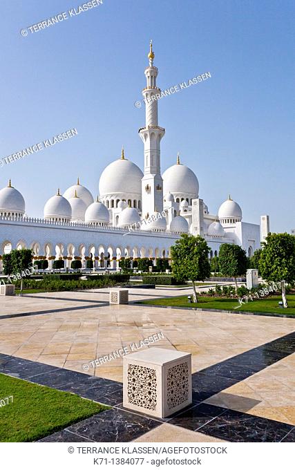 Exterior domes, arches and minarets of the the Sheikh Zayed Grand Mosque in Abu Dhabi, UAE