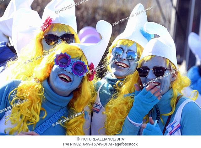16 February 2019, Baden-Wuerttemberg, Lauchringen: At a world record for the largest smurf meeting in the world, participants dressed as smurfs look into the...