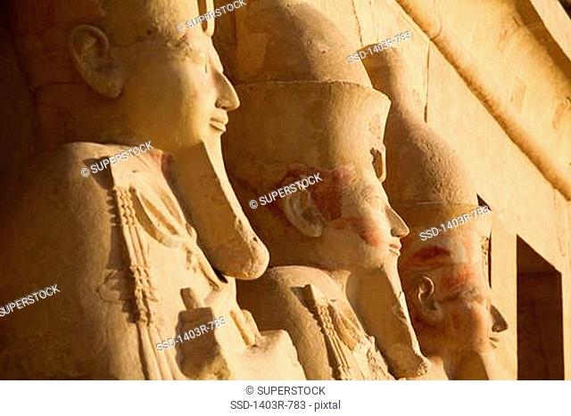 Egypt, Luxor, Osiride statues at Mortuary Temple of Hatshepsut at Deir el Bahri on West Bank of Nile River