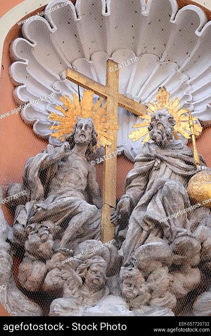 Holy Trinity on the portal of Dreifaltigkeitskirche ( Holy Trinity ) church in Graz, Styria, Austria