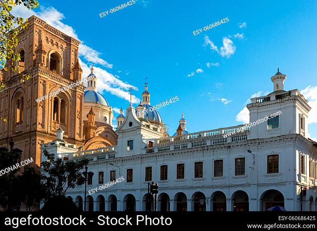 cathedral of Cuenca and historic builiding at sunset Ecuador
