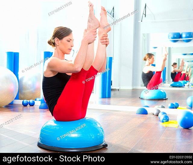 Bosu ball for fitness instructor woman in aerobics