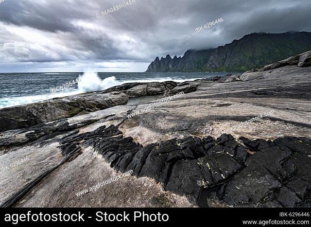 Rocky coast of Tungeneset, rocky peak Devils Teeth, Devil's Teeth, Okshornan, stone fjords, Senja Island, Troms, Norway, Europe