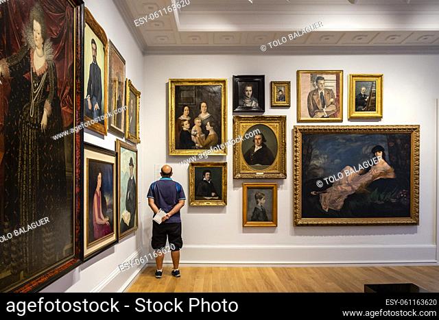man admiring artwork, Museo de Bellas Artes, Bilbao, Spain