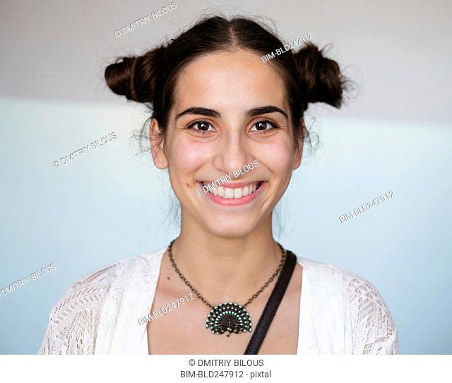 Portrait of smiling Caucasian woman wearing necklace