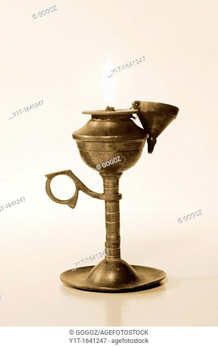 Oil lamp with flame, home