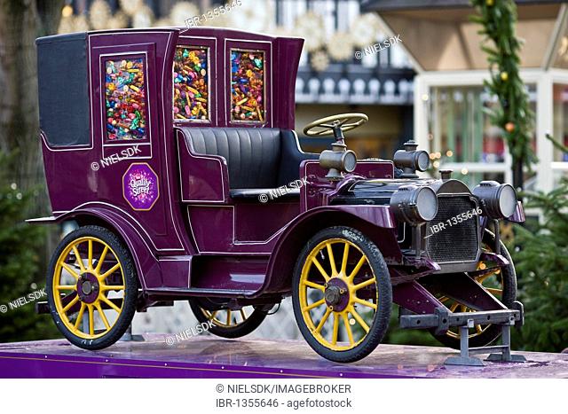 Vintage car filled with Quality Street sweets