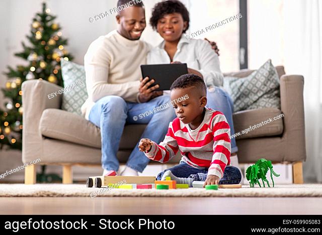 happy african american family on christmas at home