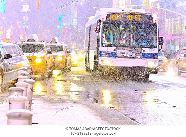 MTA M104 bus, public transportation, mass transit, Times Square during January 2, 2014 winter storm, 42nd Street vicinity, Times Square, Midtown Manhattan