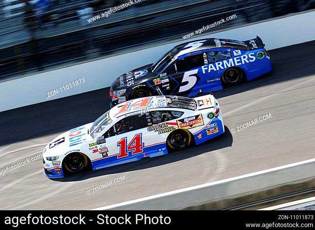 July 23, 2017 - Speedway, IN, USA: Clint Bowyer (14) and Kasey Kahne (5) battle for position during the Brantley Gilbert Big Machine Brickyard 400 at...