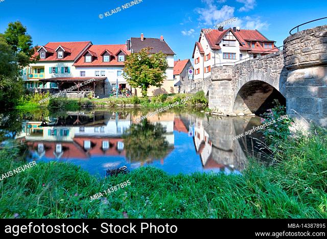 River Streu, stone bridge, The Bridge Gate House, house facade, autumn, Ostheim, Rhön-Grabfeld, Lower Franconia, Bavaria, Germany, Europe