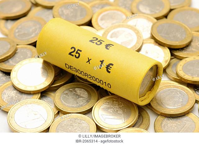 1-Euro coins, rolled up and loose coins
