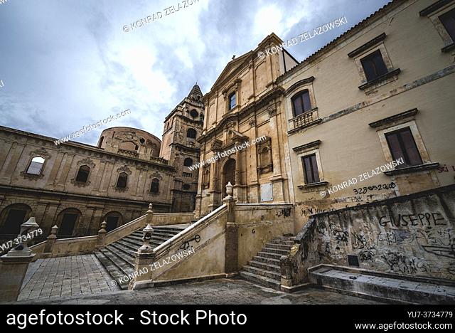 Church of Saint Francis of Assisi (Immaculate Conception) and Monastery of Holy Saviour (Monastero del San Salvatore) on left in Noto, Sicily, Italy