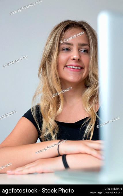 Young beautiful woman using a laptop computer