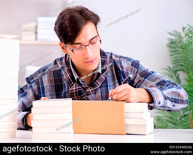 The writer presenting his books to public